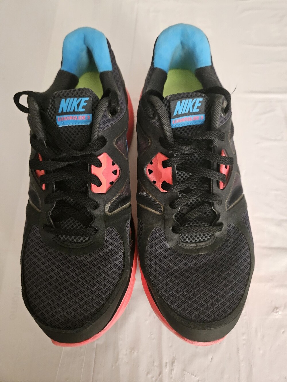 Nike Women’s Black Sneakers with Coral and Teal Accents